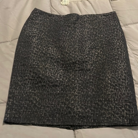 Abs Platinum Dresses & Skirts - Size 8 Black with blue zip up animal print skirt.